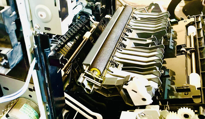 our team repairing printers | printer spare parts